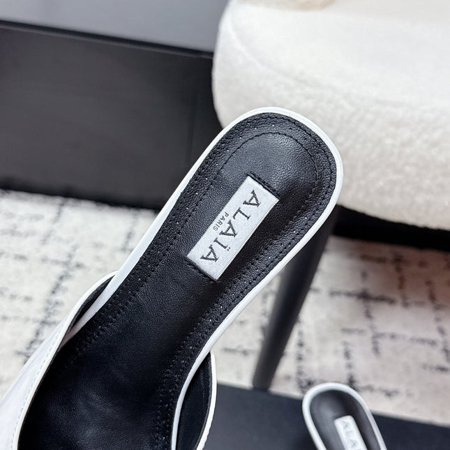 ALAIA 26S HEELED MULES 65 MM IN WHITE GLOSSY CALFSKIN