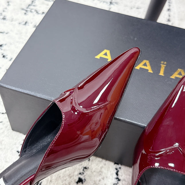 ALAIA 26S HEELED MULES 65 MM IN DARK RED GLOSSY CALFSKIN