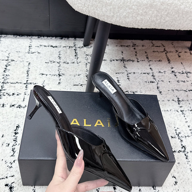 ALAIA 26S HEELED MULES 65 MM IN BLACK GLOSSY CALFSKIN
