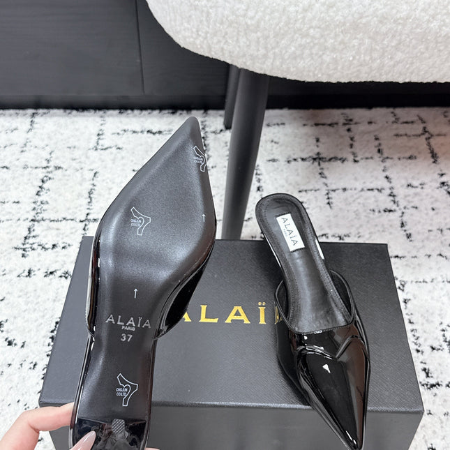 ALAIA 26S HEELED MULES 65 MM IN BLACK GLOSSY CALFSKIN