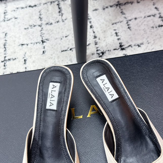 ALAIA 26S HEELED MULES 65 MM IN IVORY BEIGE SATIN
