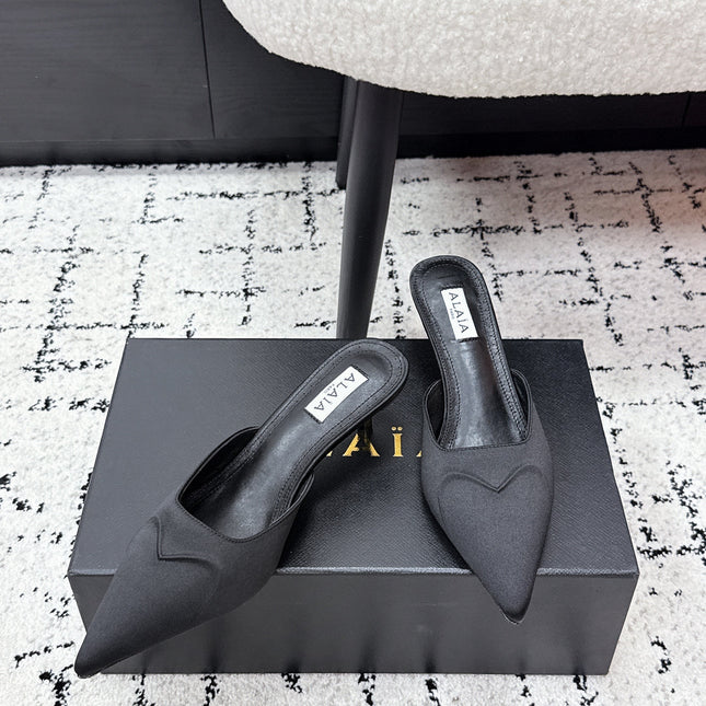 ALAIA 26S HEELED MULES 65 MM IN BLACK SATIN