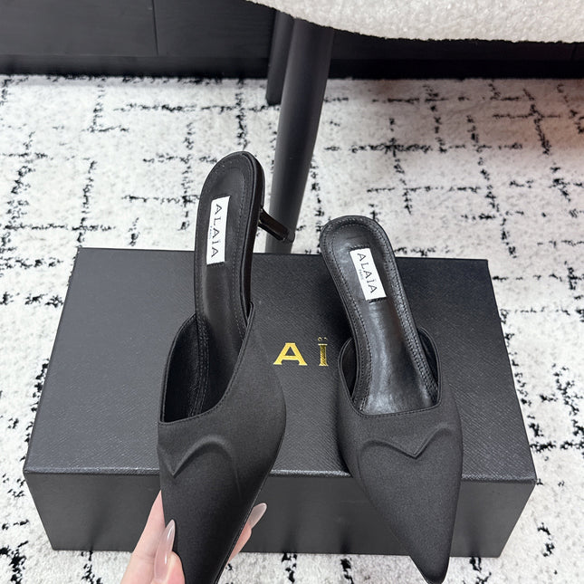 ALAIA 26S HEELED MULES 65 MM IN BLACK SATIN