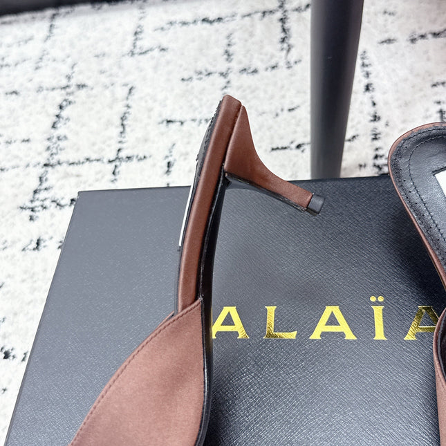 ALAIA 26S HEELED MULES 65 MM IN CHOCOLATE BROWN SATIN