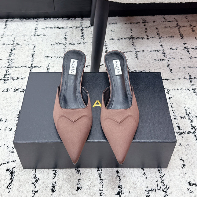 ALAIA 26S HEELED MULES 65 MM IN CHOCOLATE BROWN SATIN