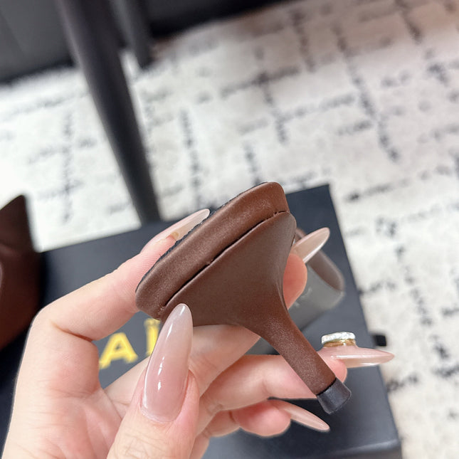 ALAIA 26S HEELED MULES 65 MM IN CHOCOLATE BROWN SATIN