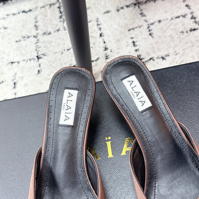 ALAIA 26S HEELED MULES 65 MM IN CHOCOLATE BROWN SATIN