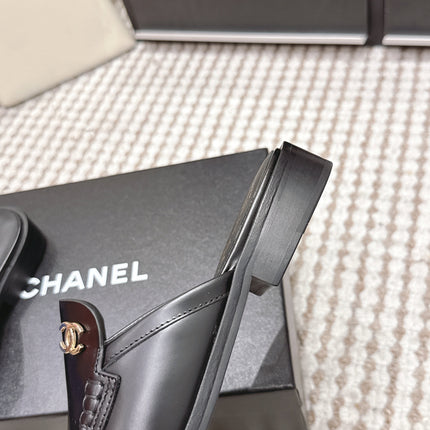 CHANEL 26S LOAFER MULES IN BLACK CALFSKIN