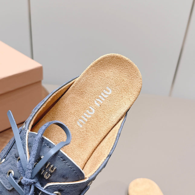MIUMIU 26S LOAFER MULES IN BLUE CALFSKIN