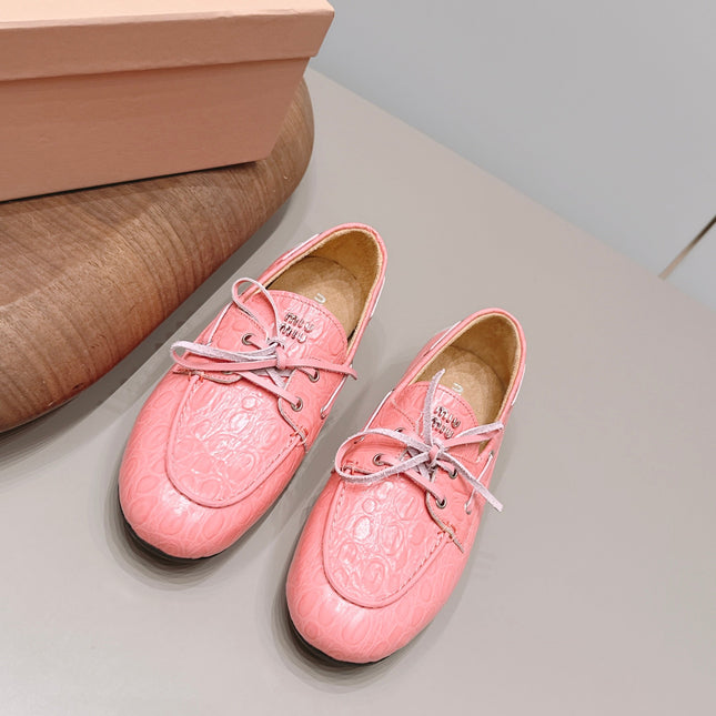 MIUMIU 26S BOAT SHOES IN PINK EMBOSSED CALFSKIN