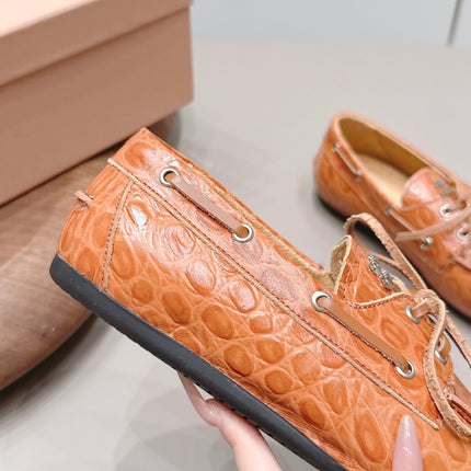 MIUMIU 26S BOAT SHOES IN ORANGE BROWN EMBOSSED CALFSKIN