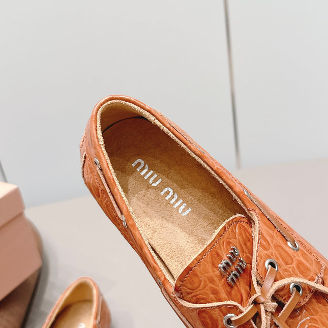 MIUMIU 26S BOAT SHOES IN ORANGE BROWN EMBOSSED CALFSKIN