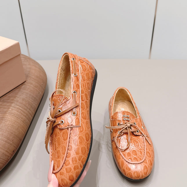 MIUMIU 26S BOAT SHOES IN ORANGE BROWN EMBOSSED CALFSKIN
