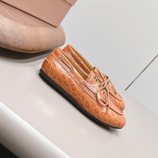 MIUMIU 26S BOAT SHOES IN ORANGE BROWN EMBOSSED CALFSKIN
