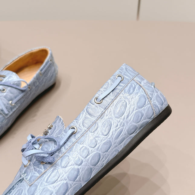 MIUMIU 26S BOAT SHOES IN BLUE EMBOSSED CALFSKIN