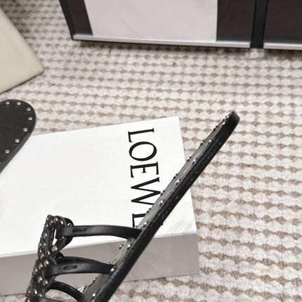 LOEWE 26S PETAL ANAGRAM SLIDE IN BLACK CALFSKIN WITH STUDS