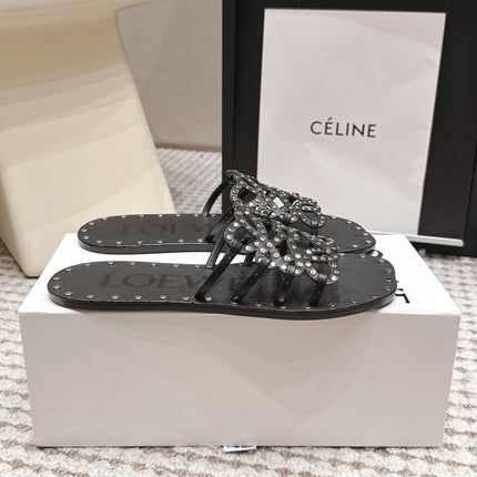 LOEWE 26S PETAL ANAGRAM SLIDE IN BLACK CALFSKIN WITH STUDS