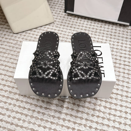 LOEWE 26S PETAL ANAGRAM SLIDE IN BLACK CALFSKIN WITH STUDS