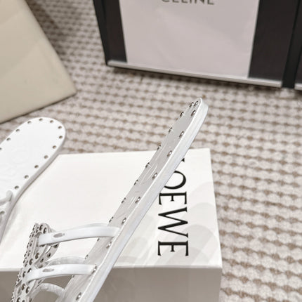 LOEWE 26S PETAL ANAGRAM SLIDE IN WHITE CALFSKIN WITH STUDS