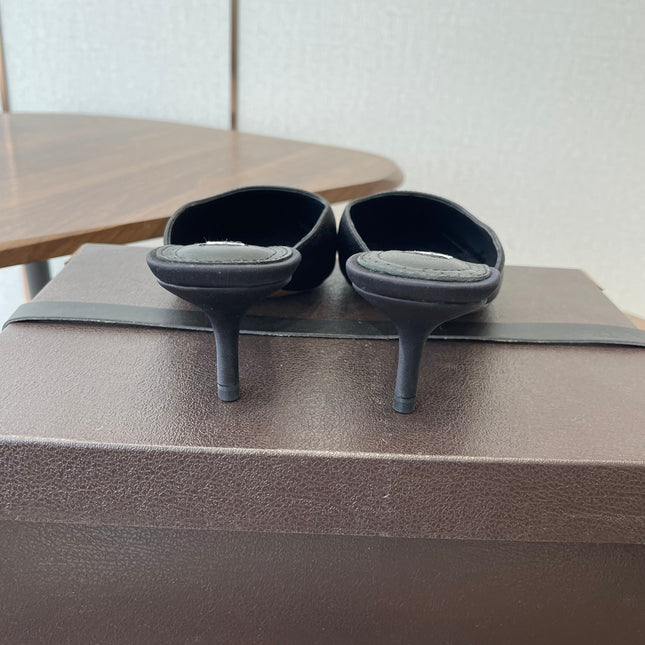 ALAIA 26S HEELED MULES 50 MM IN BLACK FABRIC