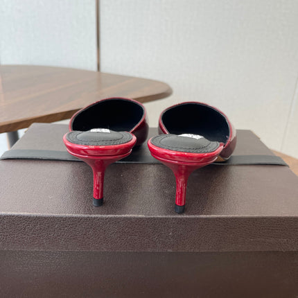 ALAIA 26S HEELED MULES 50 MM IN DARK RED GLOSSY CALFSKIN