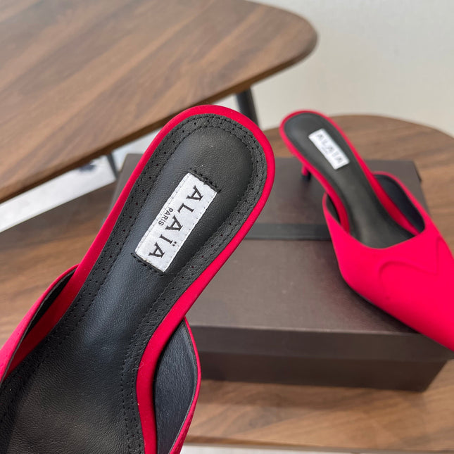 ALAIA 26S HEELED MULES 50 MM IN RED FABRIC