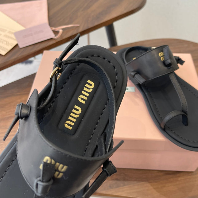 MIUMIU 26S FLIP FLOPS IN BLACK CALFSKIN