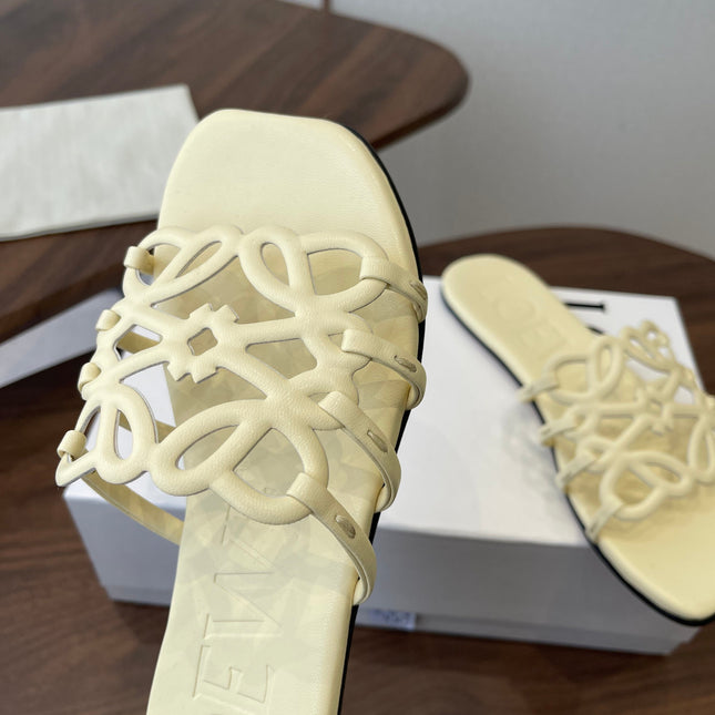 LOEWE 26S FLAT SANDALS IN LIGHT YELLOW CALFSKIN
