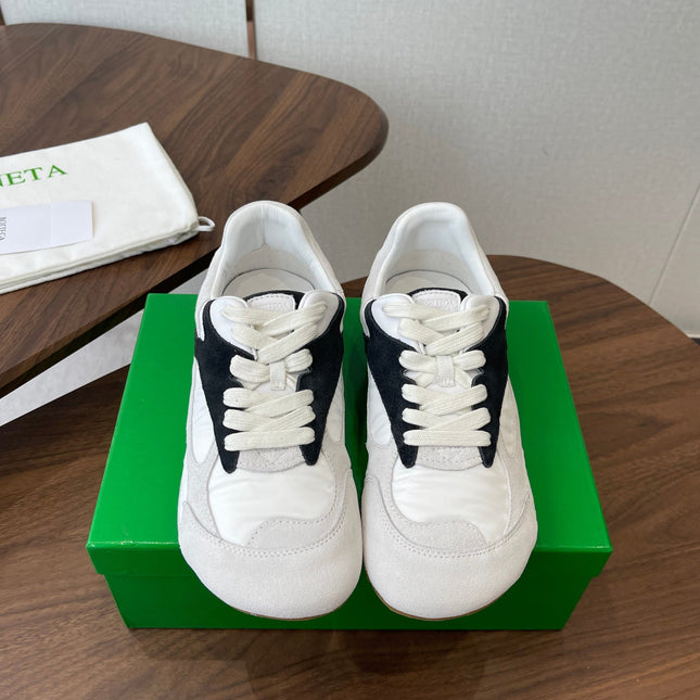 BOTTEGA VENETA 26S ORBIT FLASH SNEAKERS IN WHITE AND BLACK SUEDE