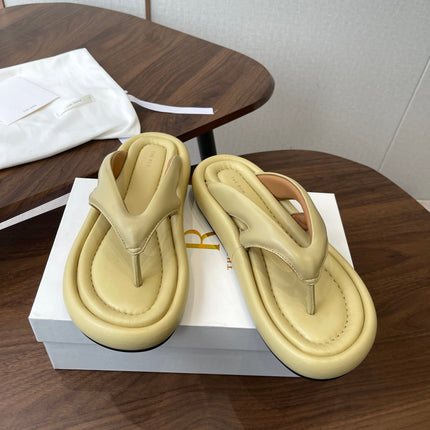 THE ROW 26S PUFFED THONG SANDALS IN BUTTER YELLOW CALFSKIN