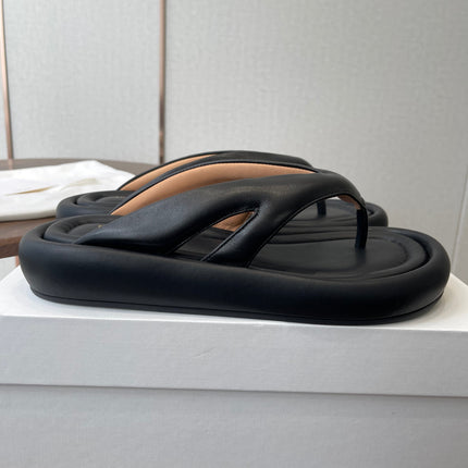 THE ROW 26S PUFFED THONG SANDALS IN BLACK CALFSKIN
