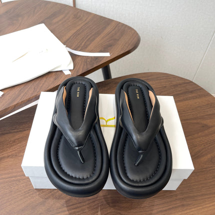 THE ROW 26S PUFFED THONG SANDALS IN BLACK CALFSKIN
