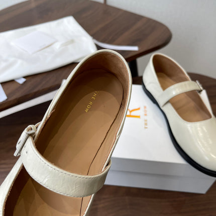 THE ROW 26S MARY JANE FLATS IN WHITE PATENT CALFSKIN