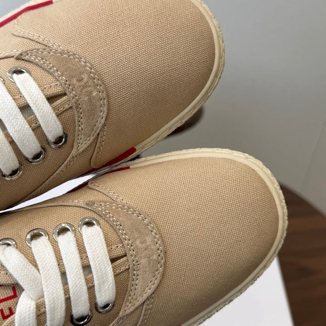 CELINE 26S TRIOMPHE LOW TOP SNEAKERS IN BEIGE CANVAS RED TRIM