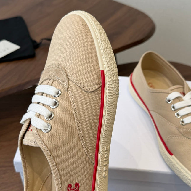 CELINE 26S TRIOMPHE LOW TOP SNEAKERS IN BEIGE CANVAS RED TRIM