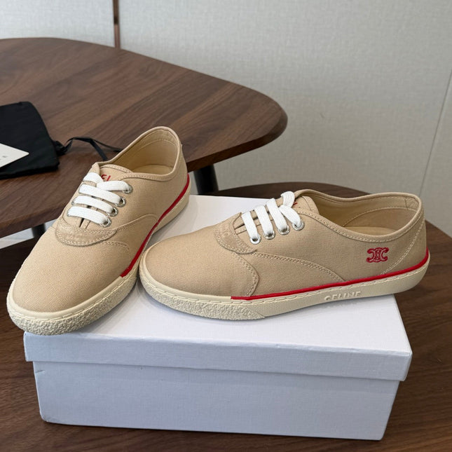 CELINE 26S TRIOMPHE LOW TOP SNEAKERS IN BEIGE CANVAS RED TRIM