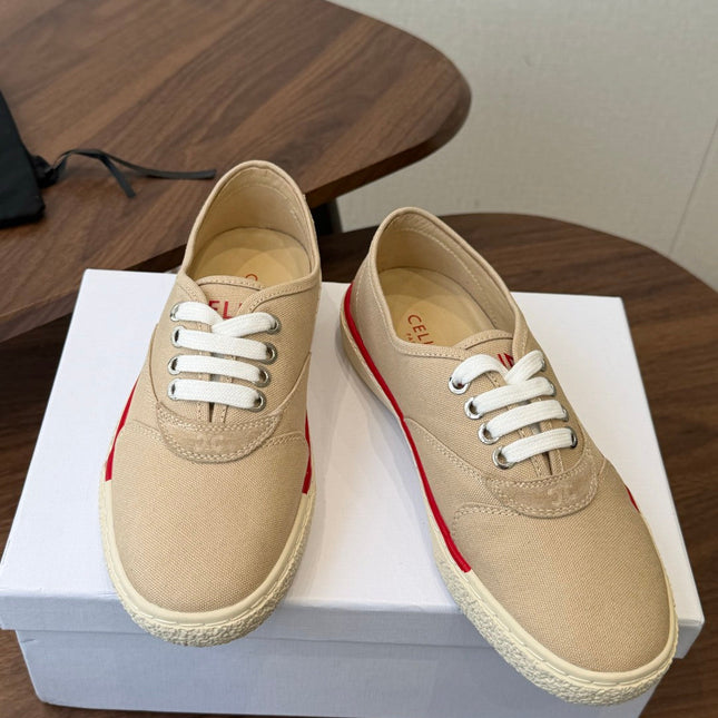 CELINE 26S TRIOMPHE LOW TOP SNEAKERS IN BEIGE CANVAS RED TRIM