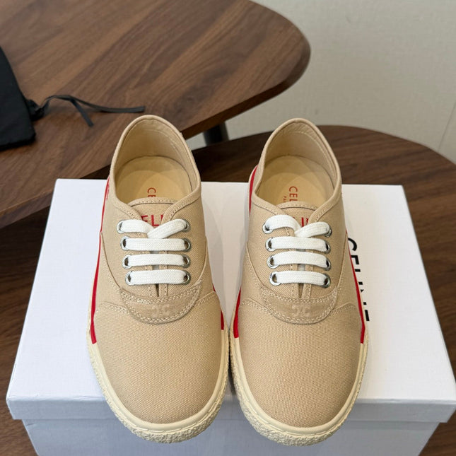 CELINE 26S TRIOMPHE LOW TOP SNEAKERS IN BEIGE CANVAS RED TRIM