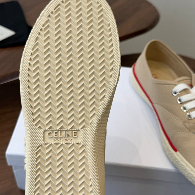 CELINE 26S TRIOMPHE LOW TOP SNEAKERS IN BEIGE CANVAS RED TRIM