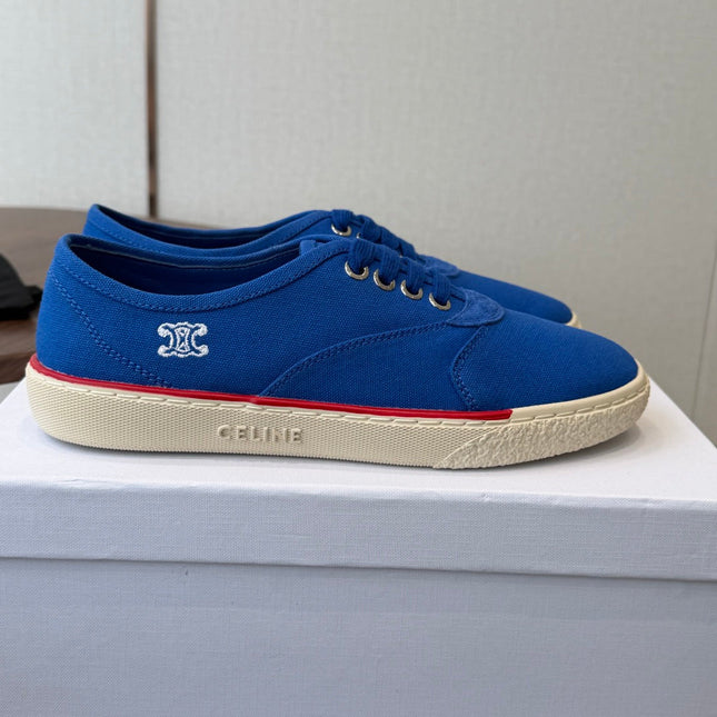 CELINE 26S TRIOMPHE LOW TOP SNEAKERS IN BLUE CANVAS RED TRIM