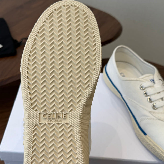 CELINE 26S TRIOMPHE LOW TOP SNEAKERS IN WHITE CANVAS BLUE TRIM