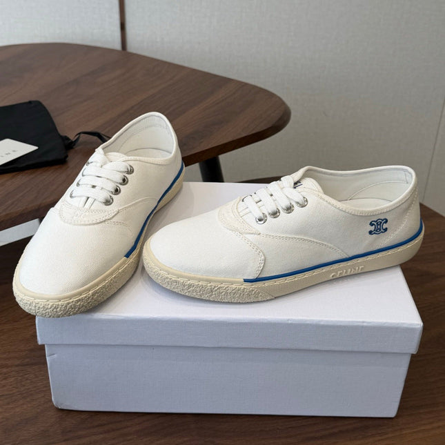 CELINE 26S TRIOMPHE LOW TOP SNEAKERS IN WHITE CANVAS BLUE TRIM