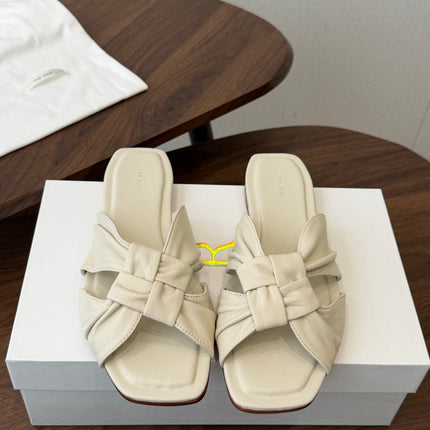 THE ROW 26S KNOT SLIDE SANDALS IN IVORY WHITE LAMBSKIN