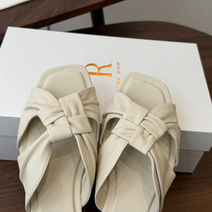 THE ROW 26S KNOT SLIDE SANDALS IN IVORY WHITE LAMBSKIN