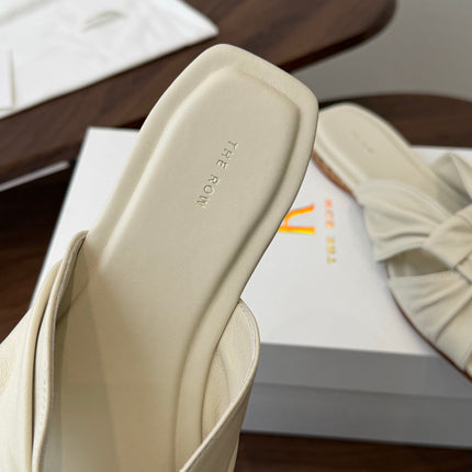 THE ROW 26S KNOT SLIDE SANDALS IN IVORY WHITE LAMBSKIN