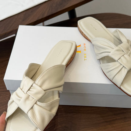 THE ROW 26S KNOT SLIDE SANDALS IN IVORY WHITE LAMBSKIN