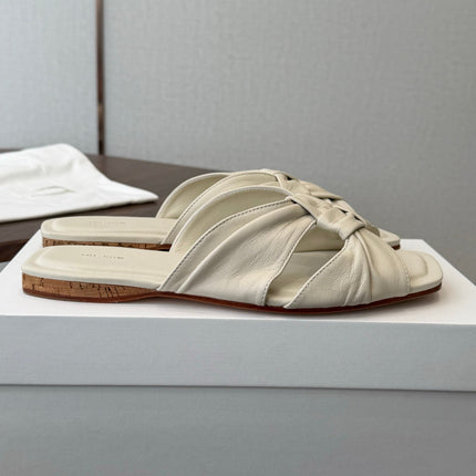 THE ROW 26S KNOT SLIDE SANDALS IN IVORY WHITE LAMBSKIN