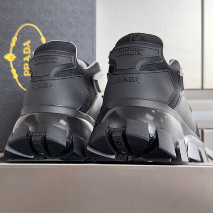PRADA 26S CLOUDBUST THUNDER SNEAKERS 60MM IN BLACK AND SILVER MESH FABRIC AND TPU