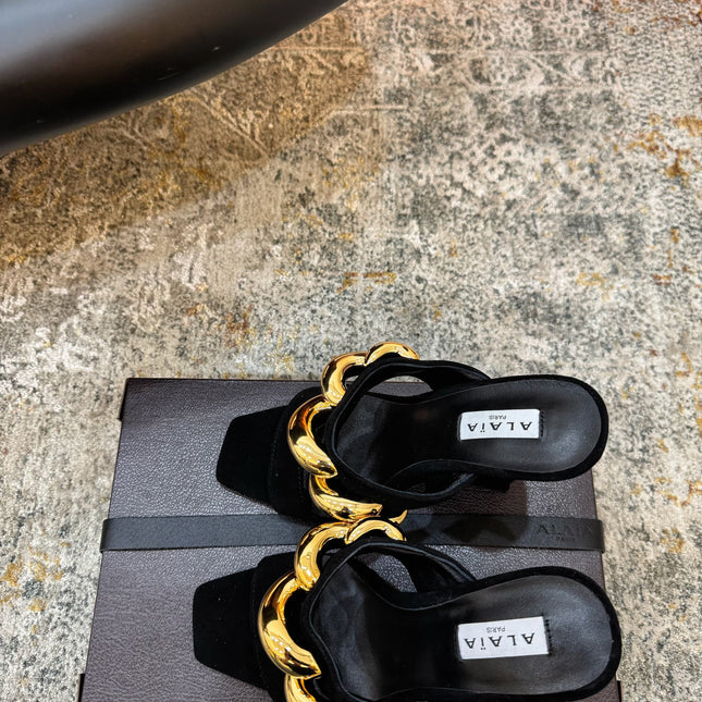 ALAIA 26S DOUBLE STRAP WEDGE SANDALS 110 MM IN BLACK SUEDE WITH GOLD HARDWARE