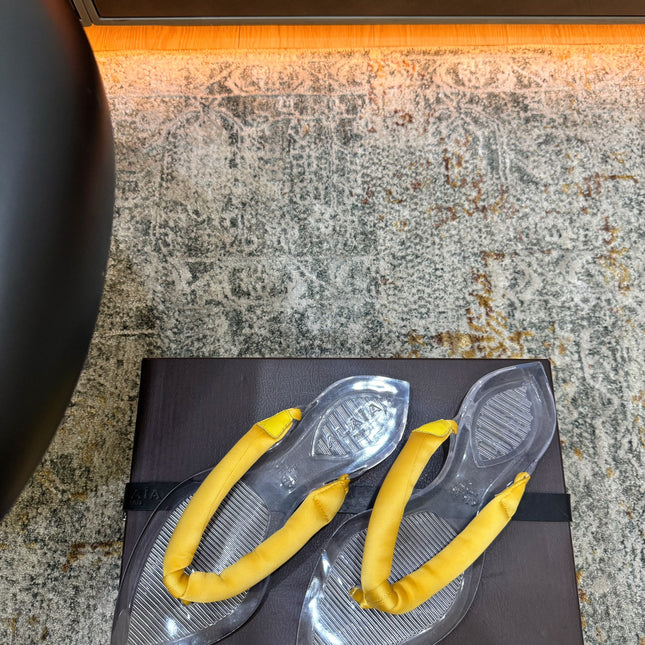 ALAIA 26S THONG SANDALS IN YELLOW SATIN AND TRANSPARENT PVC